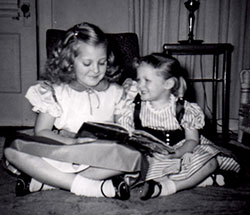 Sheryl reading to younger sister Connie